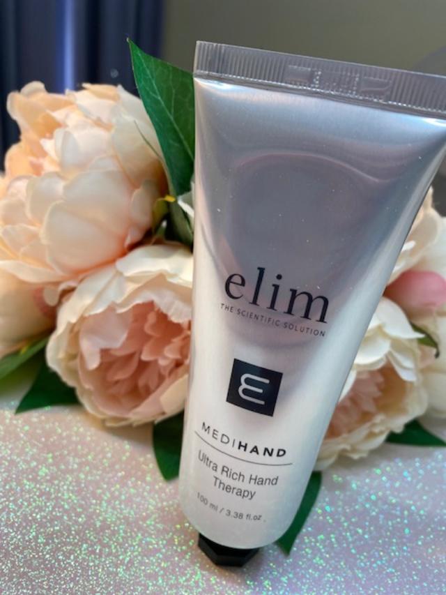 Tube of Elim Medi Hand Ultra Rich Hand Cream in a spa setting