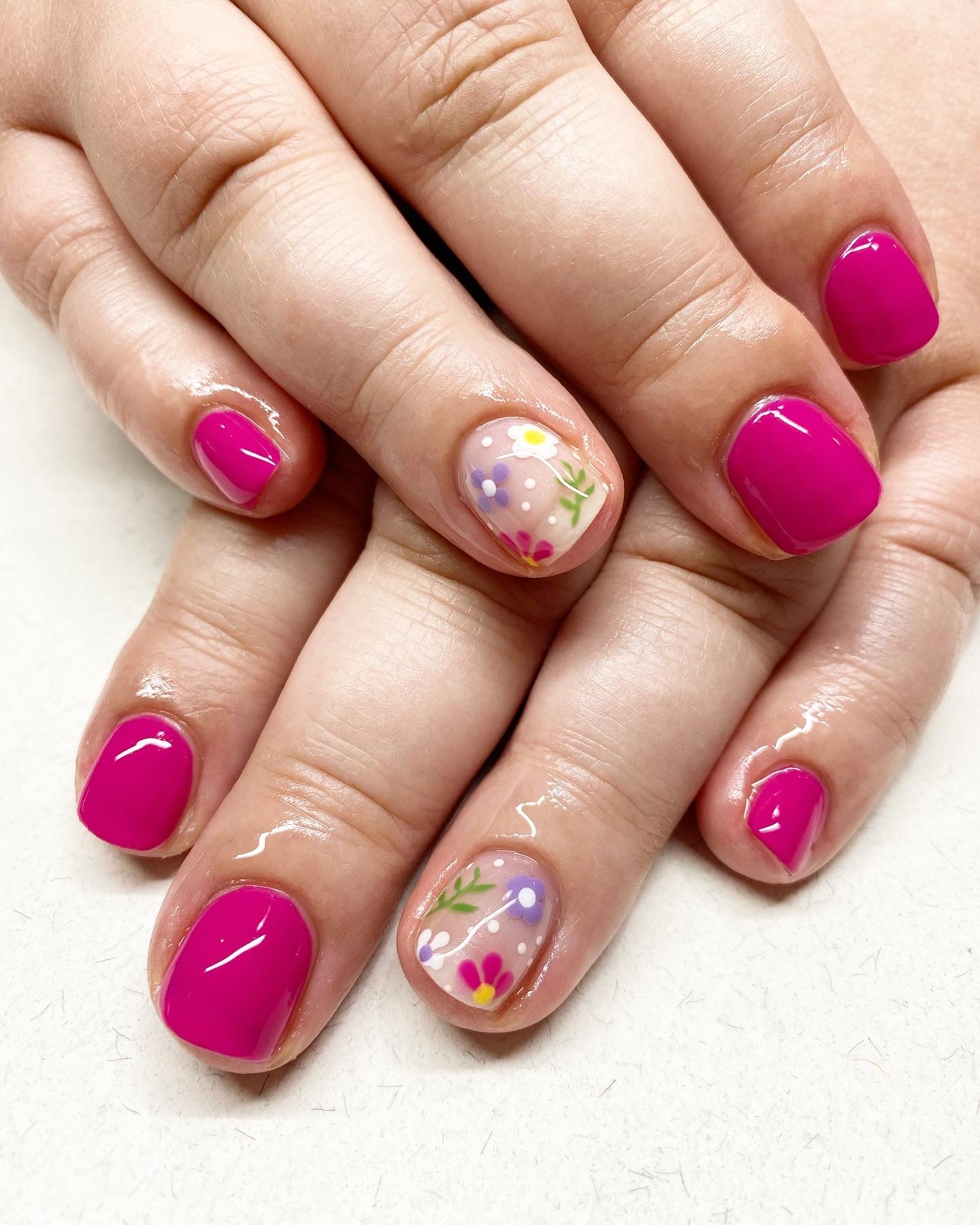 Pink nails with floral feature nail