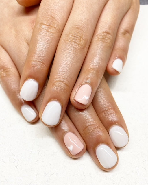 White nails with pink feature nail