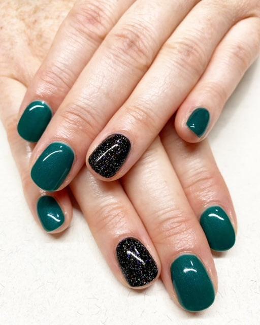 Green nails with black feature nail